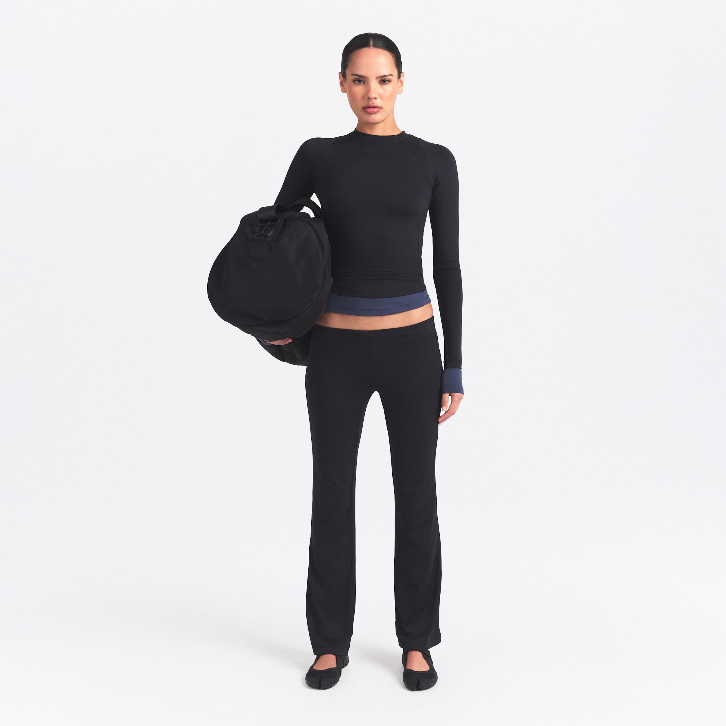 Nike Women's SKIMS Airy Low-Rise Mini Flare Pant by NIKE
