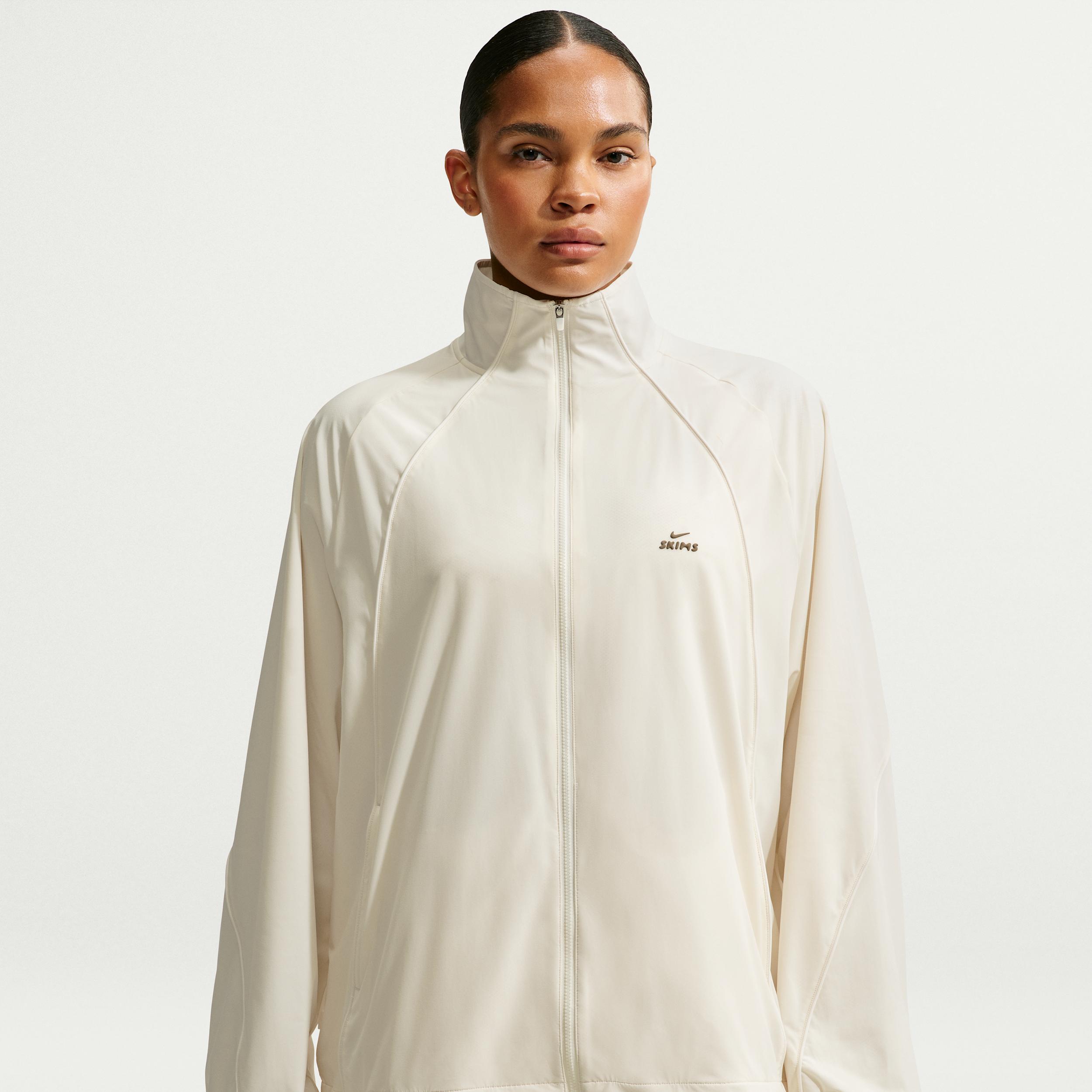Nike Women's SKIMS Stretch Nylon Oversized Jacket by NIKE