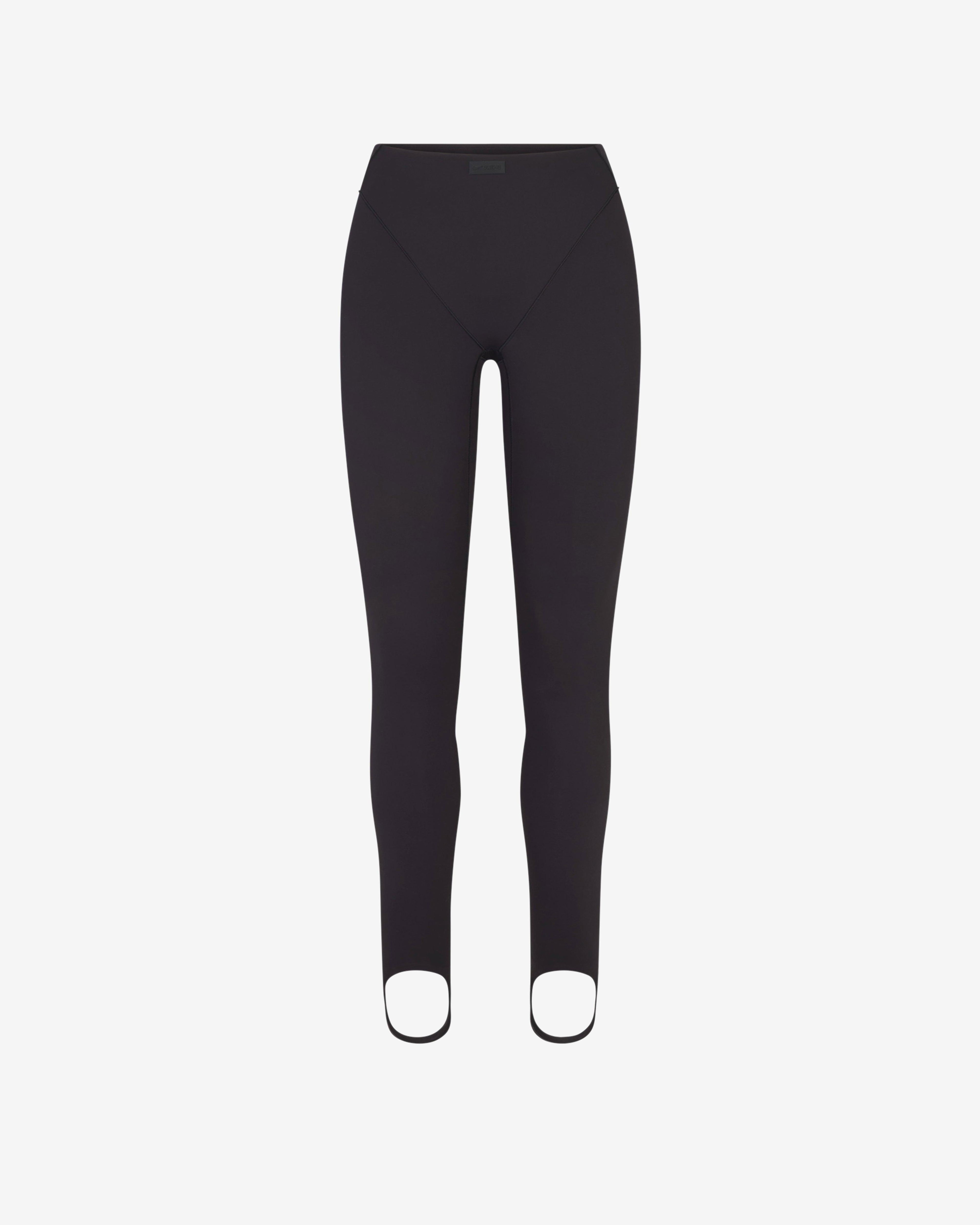 NikeSKIMS - Women's Matte V-Panel Stirrup Leggings - (Obsidian) by NIKE