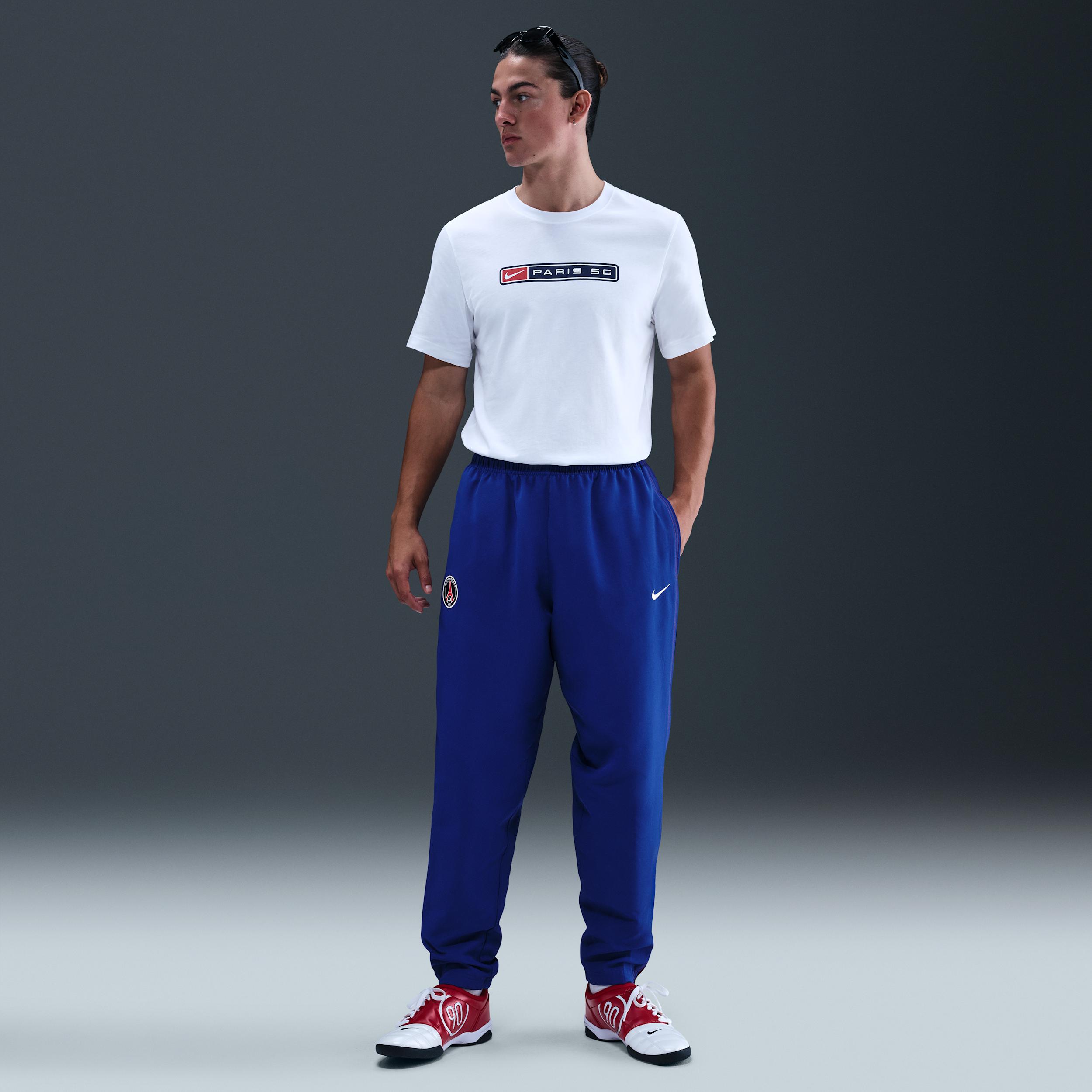 Paris Saint-Germain 2004 Total 90 Reissue Nike Men's Soccer Replica Track Pants by NIKE Paris Saint-Germain 2004 Total 90 Reissue Nike Men's Soccer Replica Track Pants by NIKE