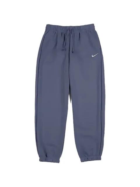 Phoenix track pants by NIKE