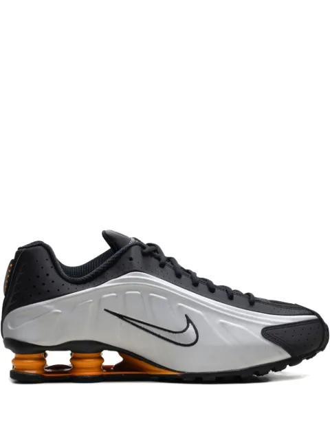 Shox R4 "Black/Vast Grey/Bright Mandarin/Metallic Silver" sneakers by NIKE