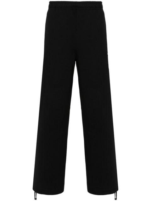 Solo Swoosh wide-leg track pants by NIKE