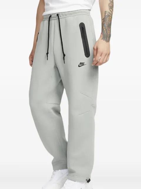 Tech Fleece "Mica Green/Black" track pants by NIKE