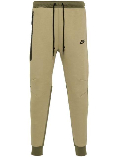 Tech Fleece tapered track pants by NIKE