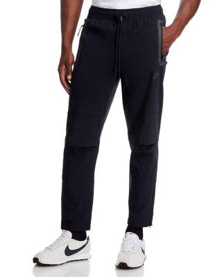 Tech Woven Pants by NIKE
