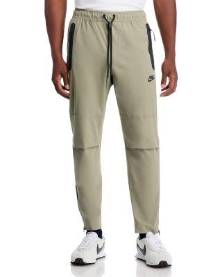 Tech Woven Pants by NIKE