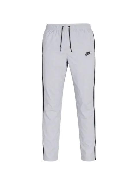 Tech Woven Reflective track pants by NIKE