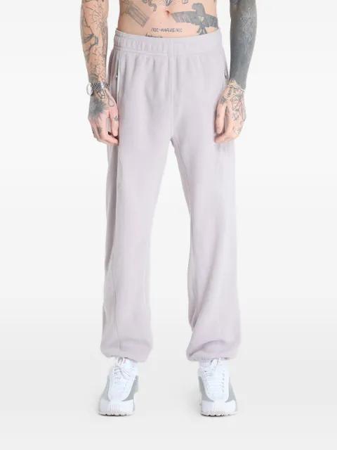 Wolf Tree track pants by NIKE