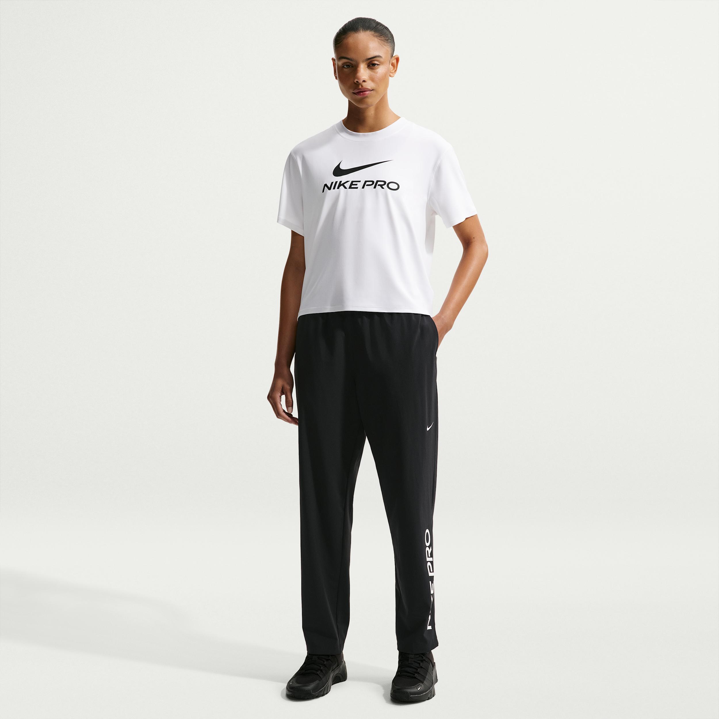Women's Nike Pro 365 Dri-FIT Mid-Rise Woven Pants by NIKE