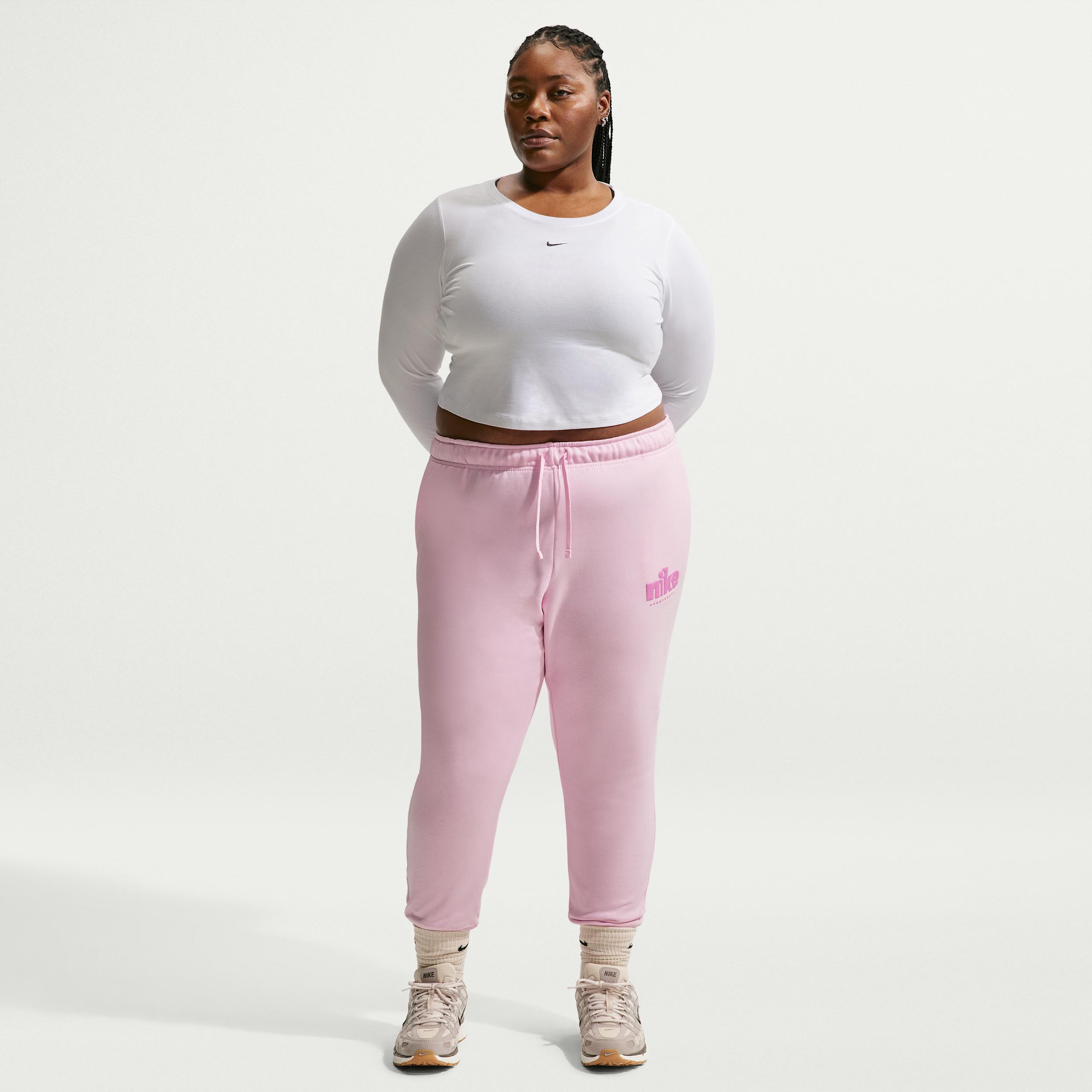 Women's Nike Sportswear Club Fleece Graphic Mid-Rise Pants (Plus Size) by NIKE