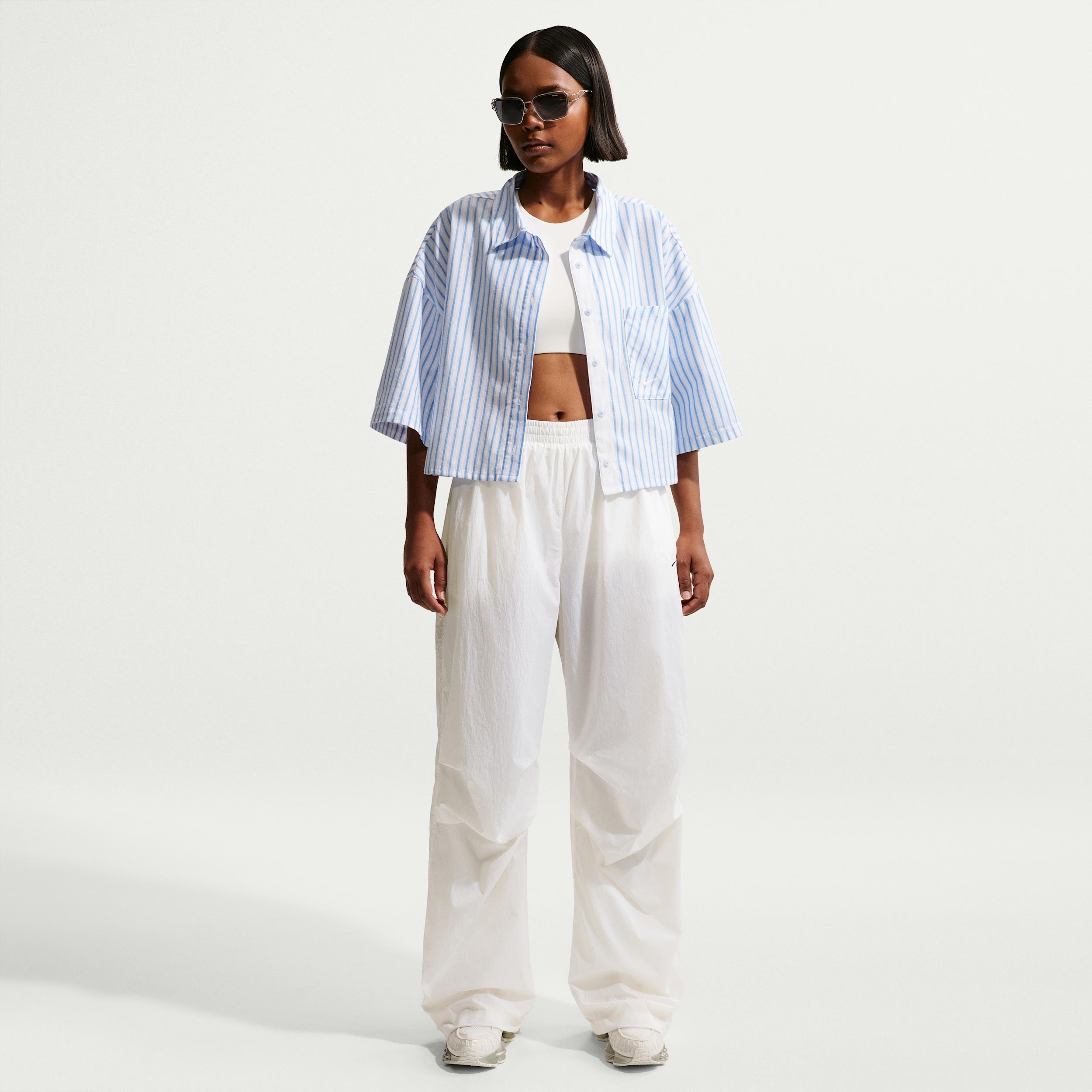 Women's Nike Sportswear Mid-Rise Lightweight UV Pants by NIKE