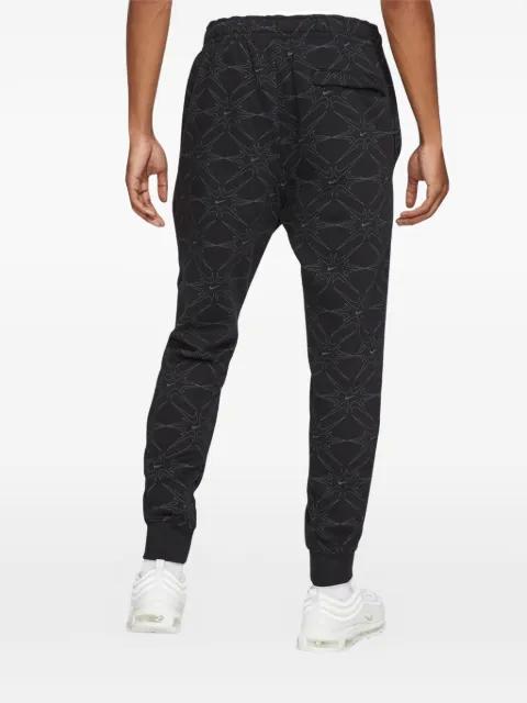 all-over print club joggers by NIKE