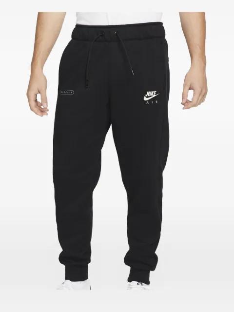 brushed track pants by NIKE