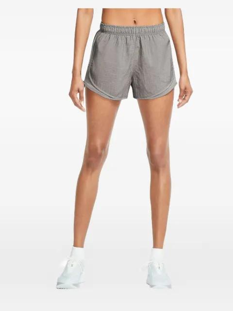 curved-hem running shorts by NIKE