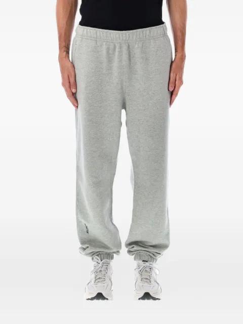 elastic-cuff fleece track pants by NIKE