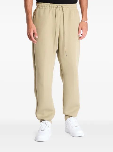 elastic-waistband fleece trousers by NIKE