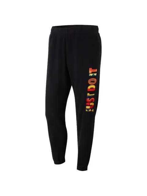 embroidered track pants by NIKE