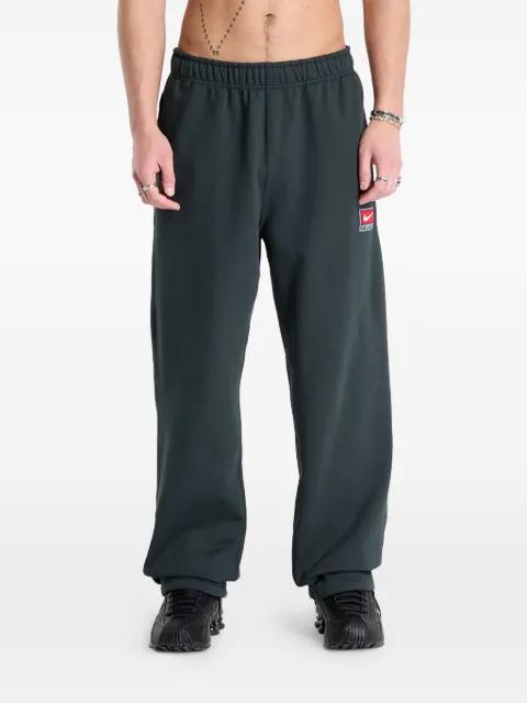 fleece tie-hem track pants by NIKE