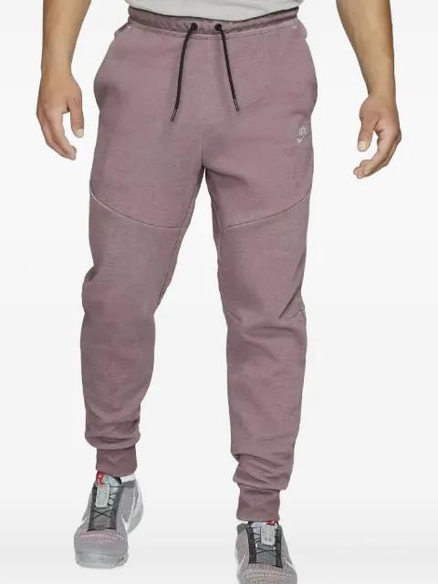 fleece track pants by NIKE