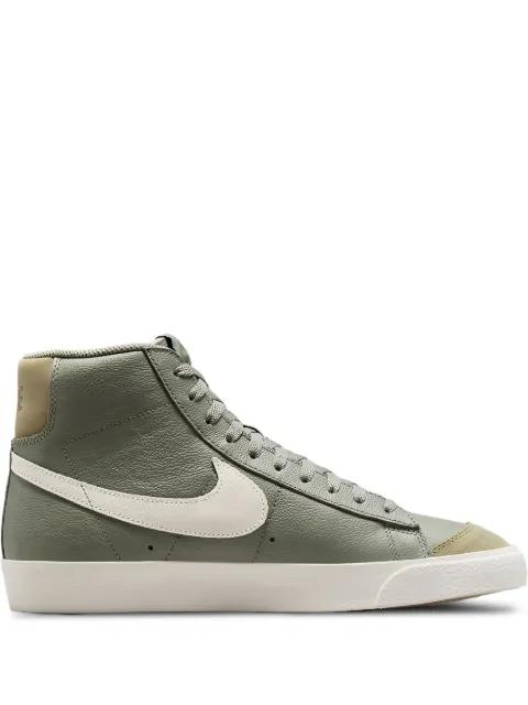 leather swoosh trainers by NIKE