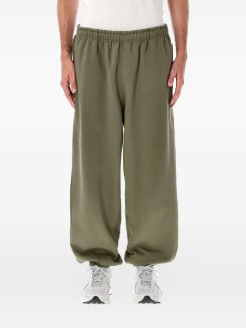 swoosh-embellished track pants by NIKE