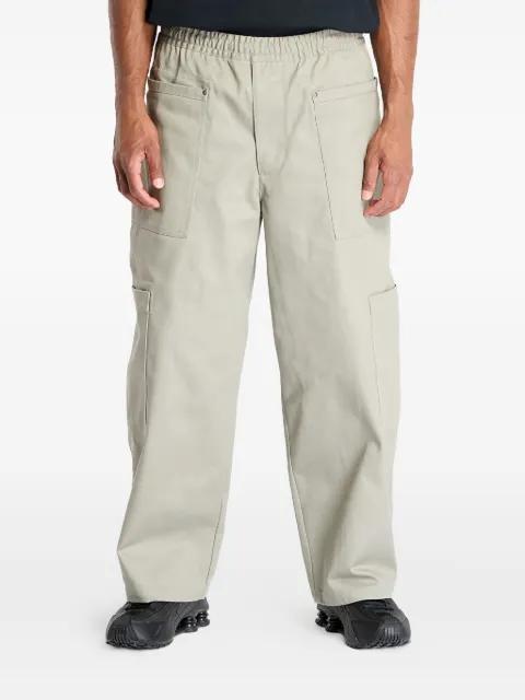 utility-pockets wide-leg trousers by NIKE