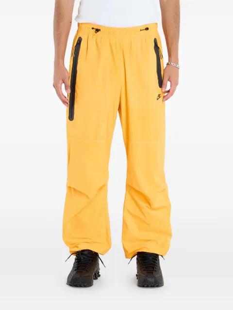 zip-pocket woven trousers by NIKE