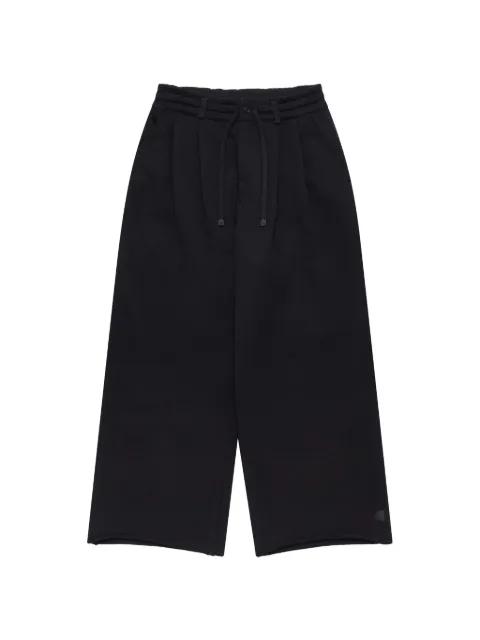 pleated track pants by NOIR KEI NINOMIYA