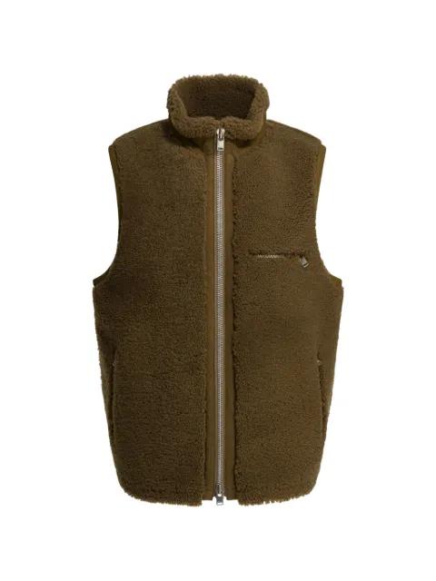 zip-up sleeveless jacket by NONNATIVE