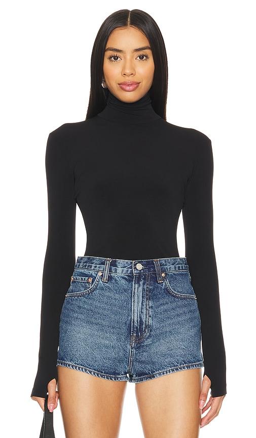 Norma Kamali Slim Fit Long Sleeve Turtleneck Top in Black by NORMA KAMALI