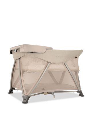 SENA™ aire Play Yard & Travel Crib + SENA™ series changer by NUNA