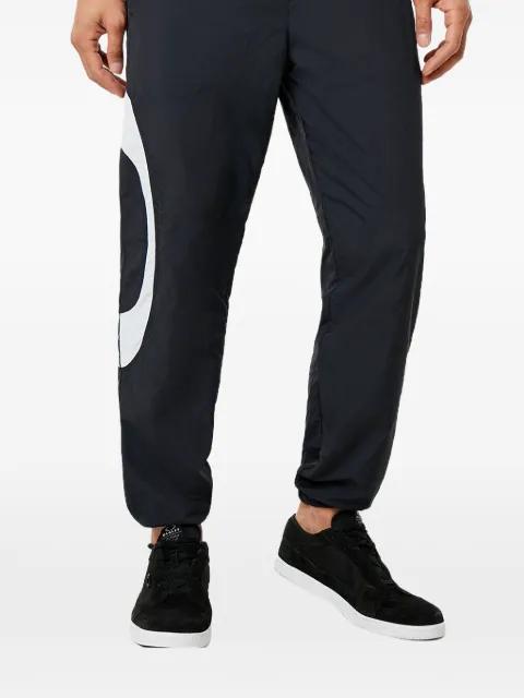 Legacy Ellipse track pants by OAKLEY