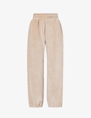 Karina brand-embroidered relaxed-fit cotton-blend velour jogging bottoms by OBEY