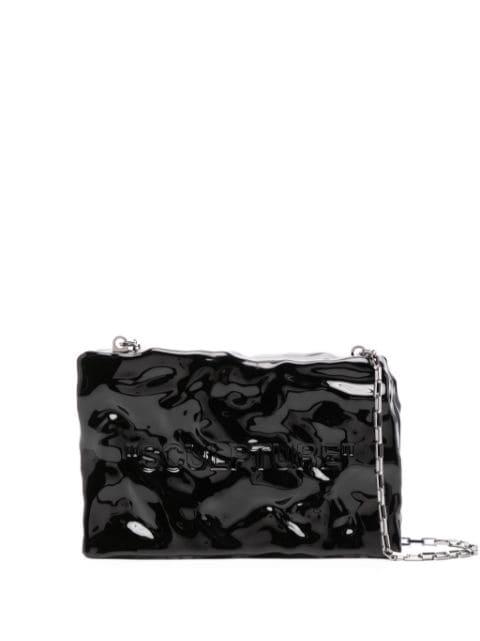 Quote textured clutch bag by OFF-WHITE