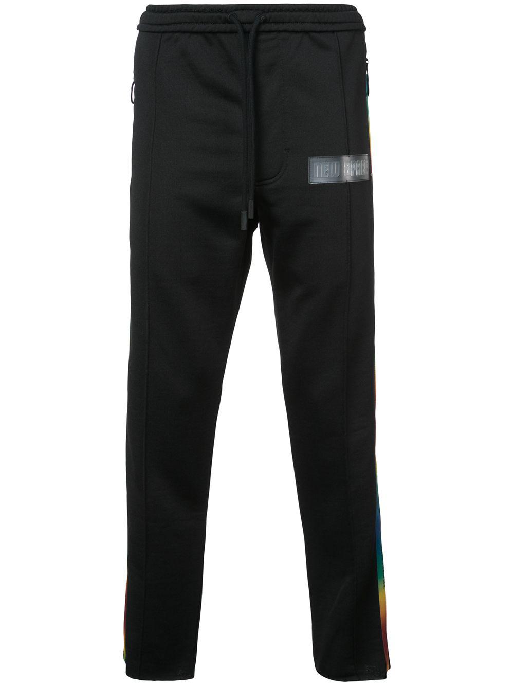 dad time travelling track trousers by OFF-WHITE