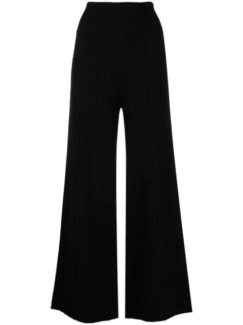 ribbed knit flared trousers by ONEFIFTEEN