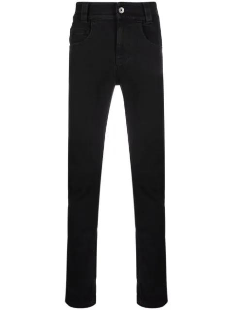 logo-patch skinny jeans by OPENING CEREMONY