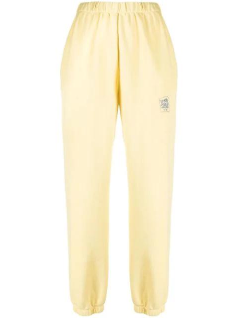 warped logo-print track pants by OPENING CEREMONY