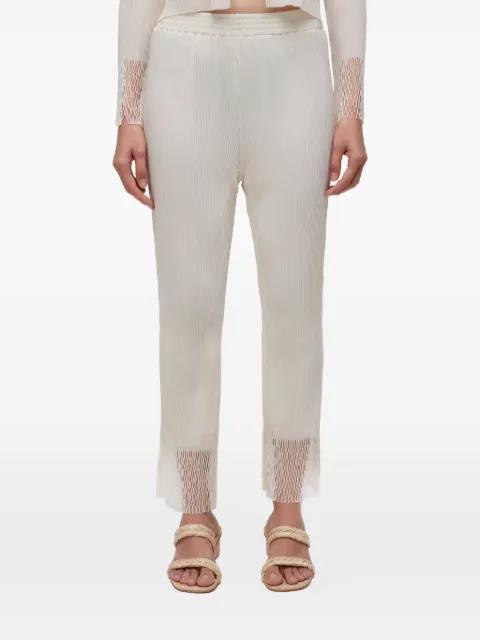 pleated fringed trousers by OSKLEN