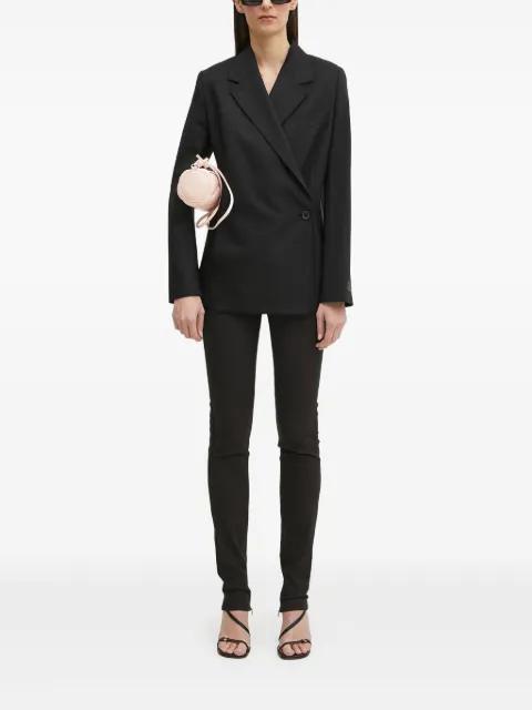 wrap-effect trousers by OTTOLINGER