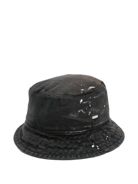 paint-splatter bucket hat by OUR LEGACY
