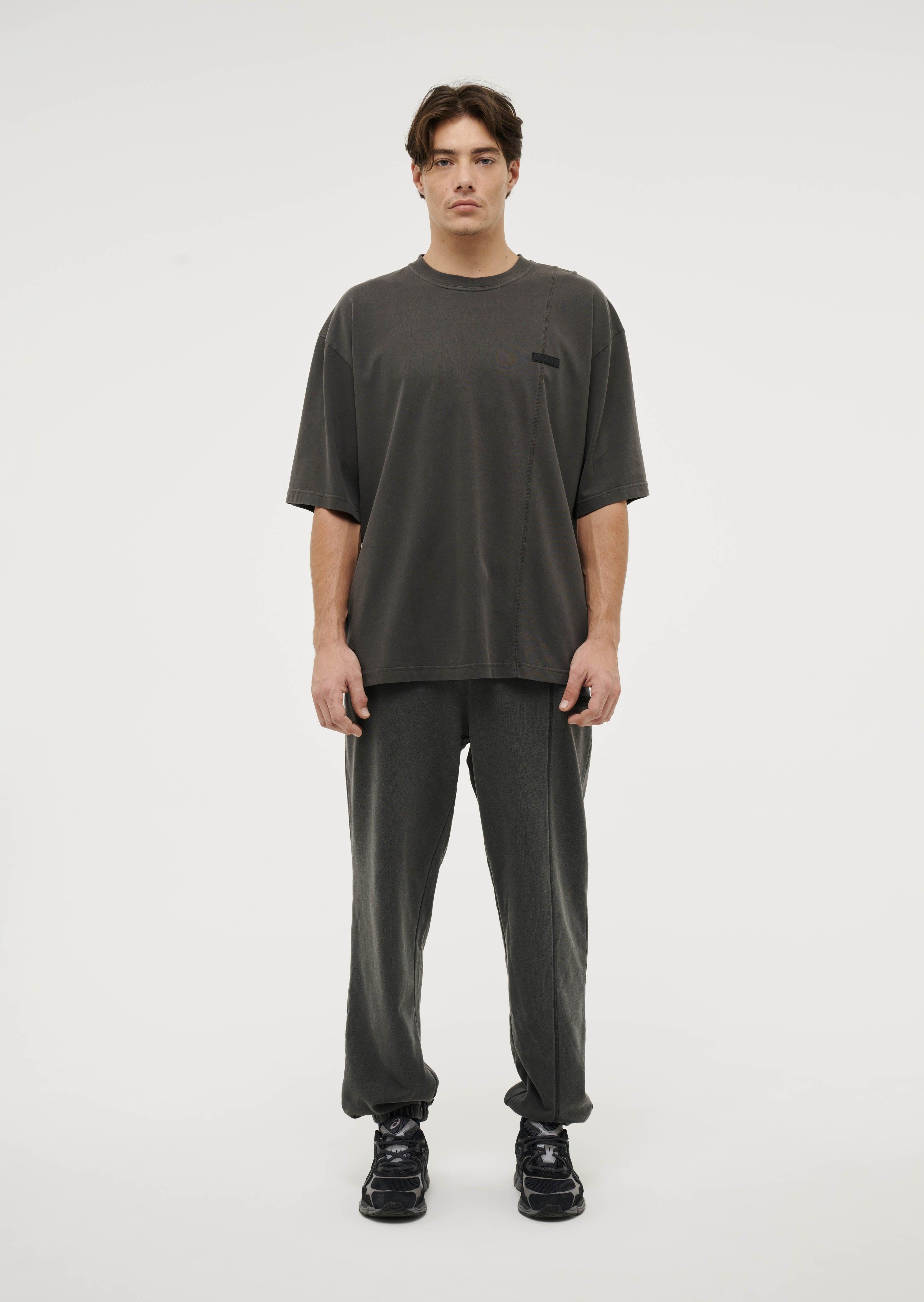 BOUNDARY LINE TRACKPANT IN WASHED BLACK by P.E NATION