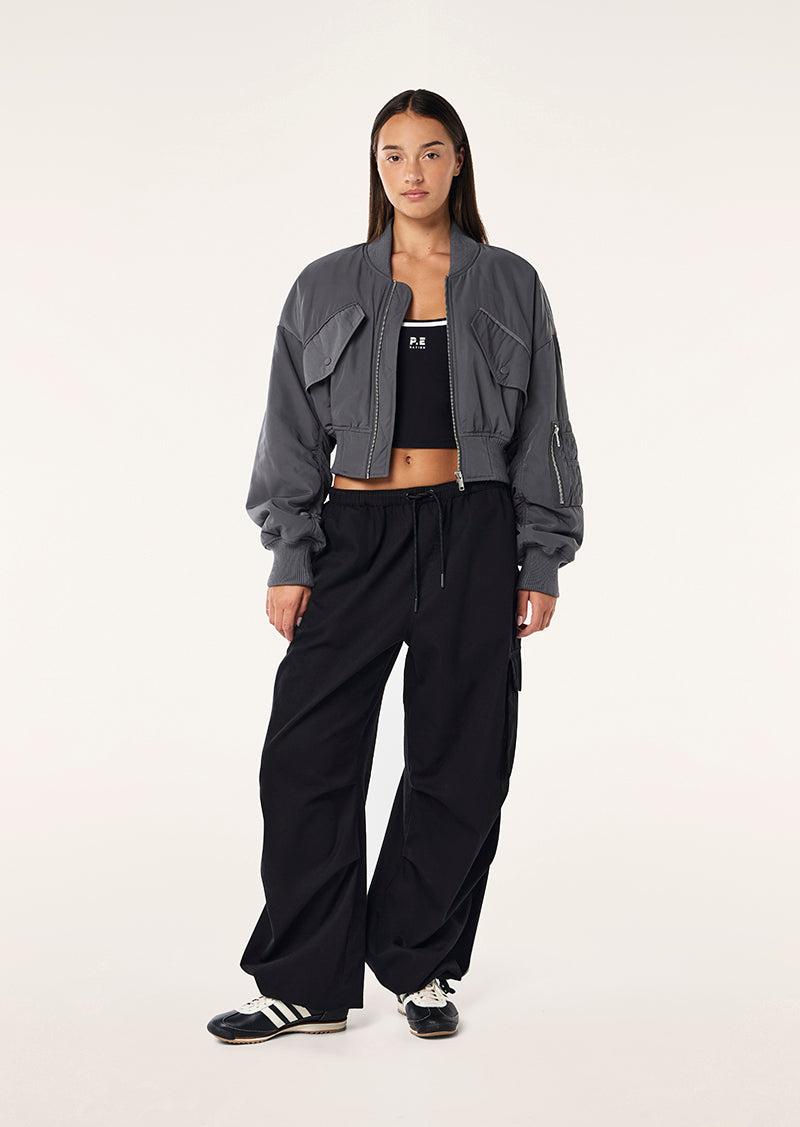 CAPTIVATE BOMBER IN ASPHALT by P.E NATION
