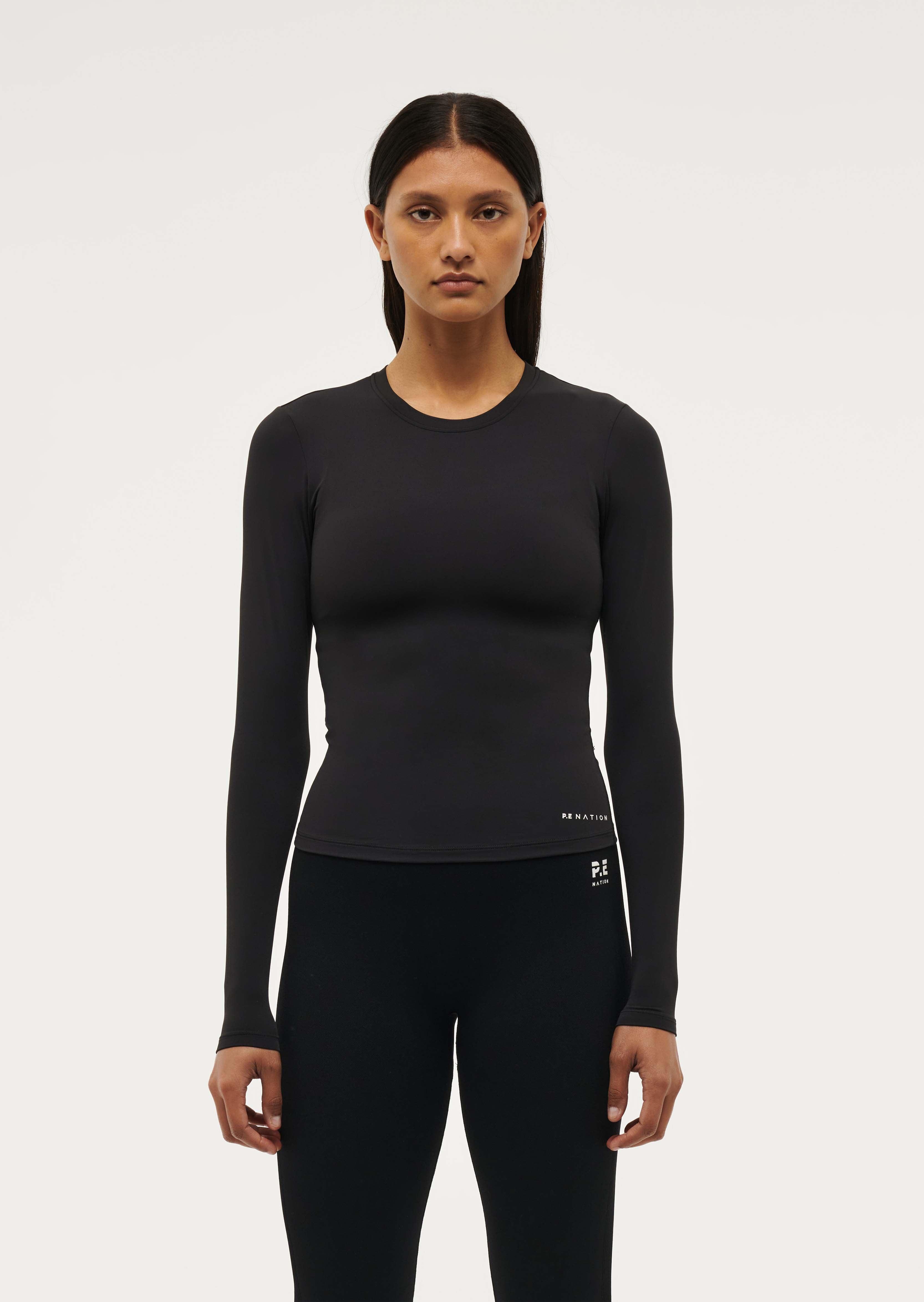 FOUNDATION LONG SLEEVE TOP IN BLACK by P.E NATION
