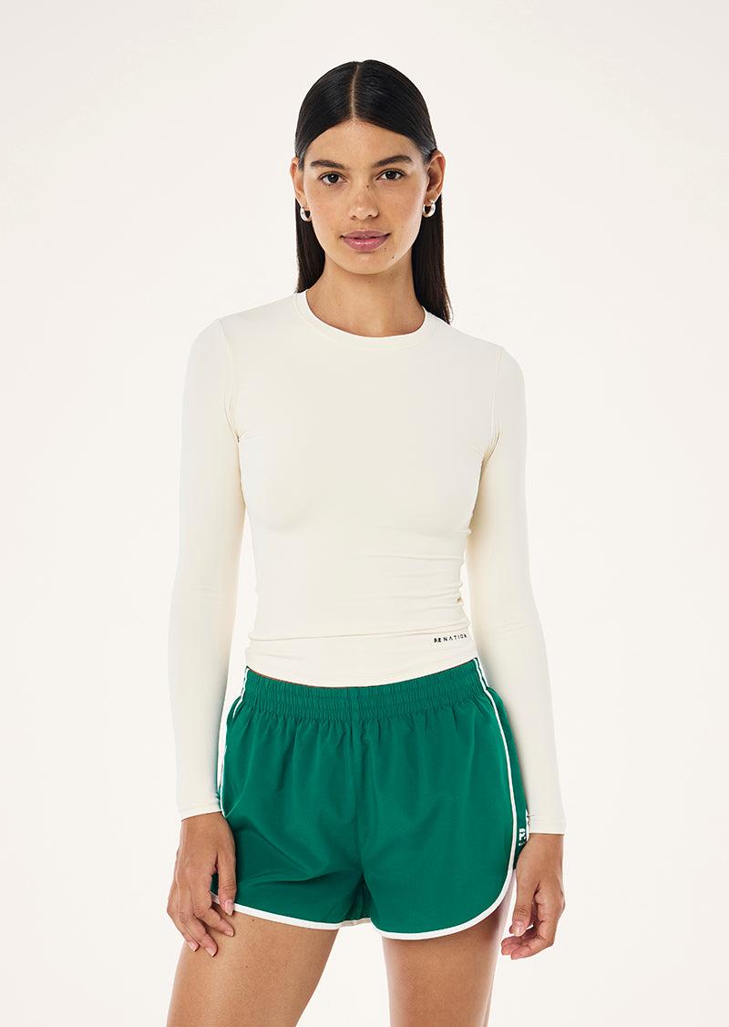 FOUNDATION LONG SLEEVE TOP IN WHISPER WHITE by P.E NATION
