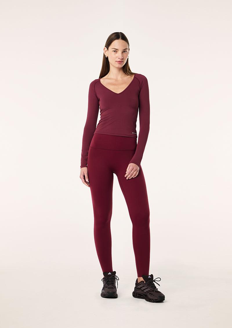 FOUNDATION V NECK LONG SLEEVE TOP IN BURGUNDY by P.E NATION