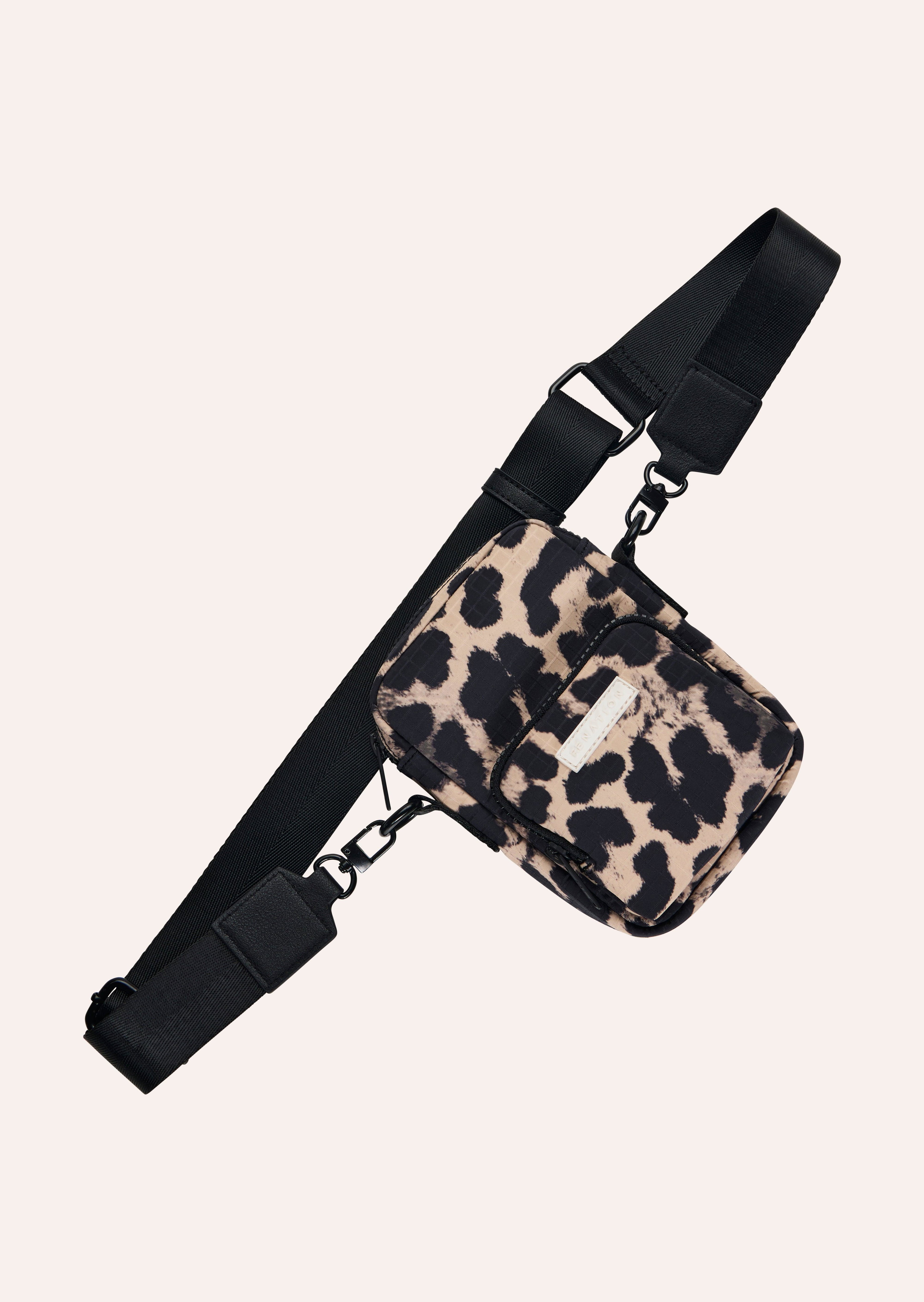 FUNDAMENTAL CROSSBODY BAG IN LEPOARD by P.E NATION
