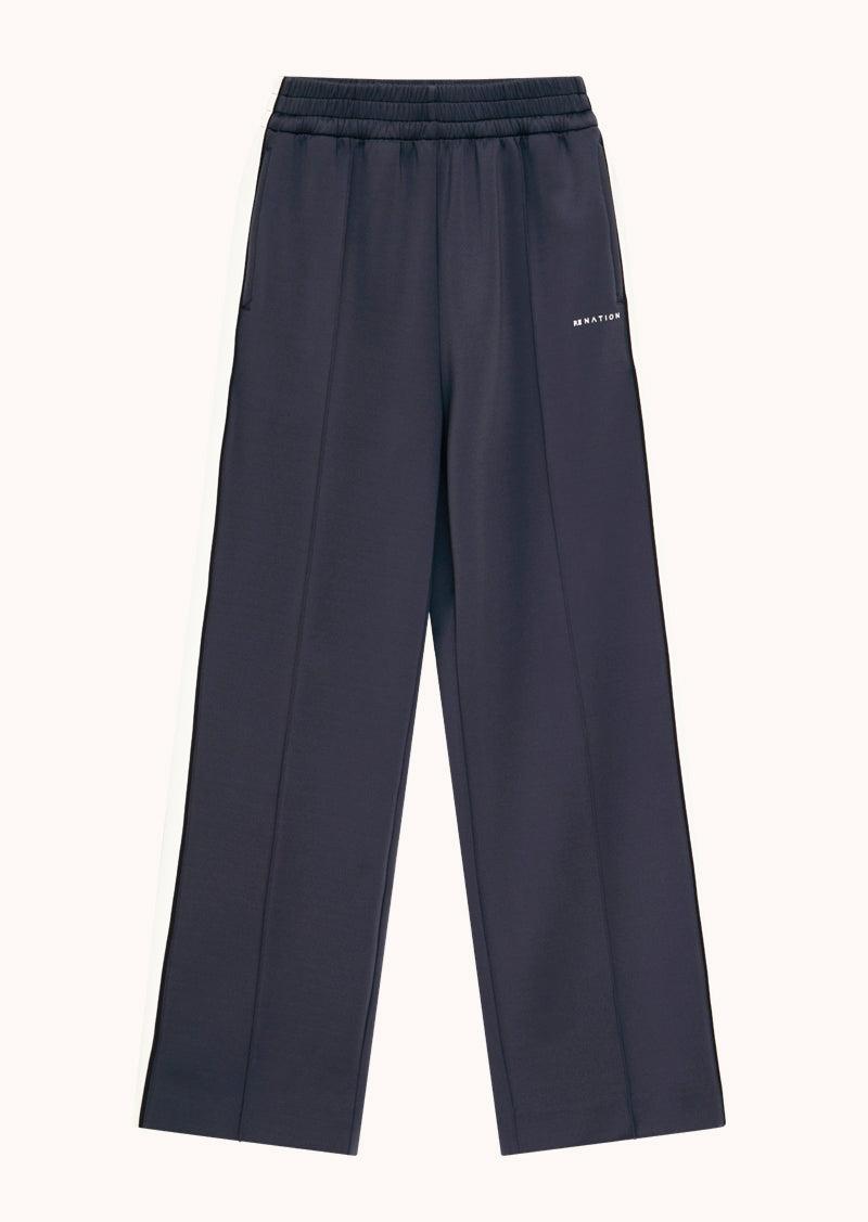 MAN DOWN TRACKPANT IN MARINE BLUE & WHISPER WHITE by P.E NATION