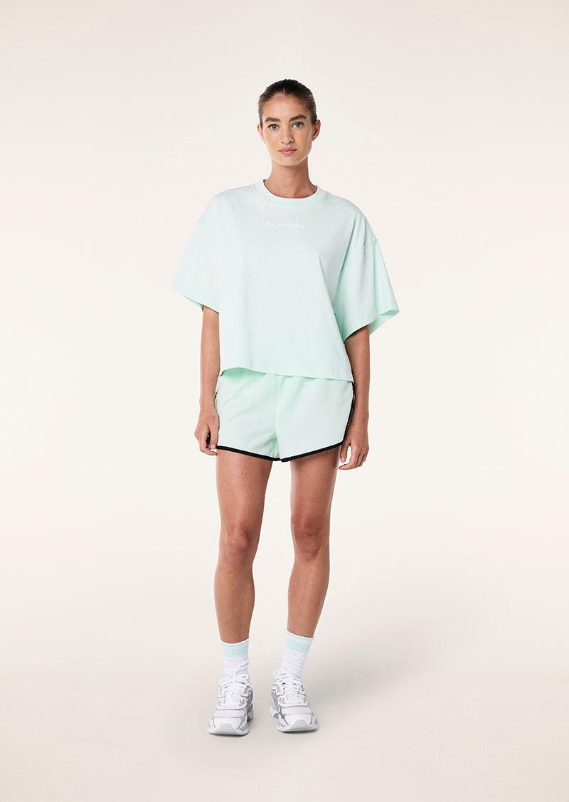 NAMEDROP TEE IN HINT OF MINT by P.E NATION